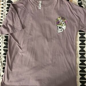 Purple Graphic T-Shirt with Floral Skull Design
